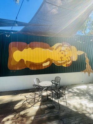 Enjoy lunch on our patio under our HoneyBear mural!