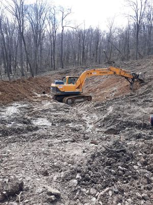 Working on digging a pond