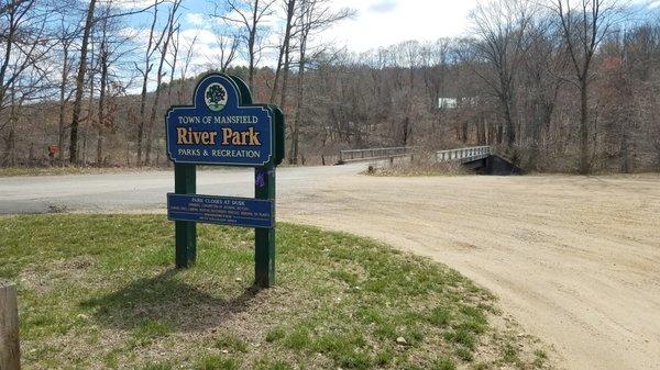 Park entrance sign and adjacent bridge.