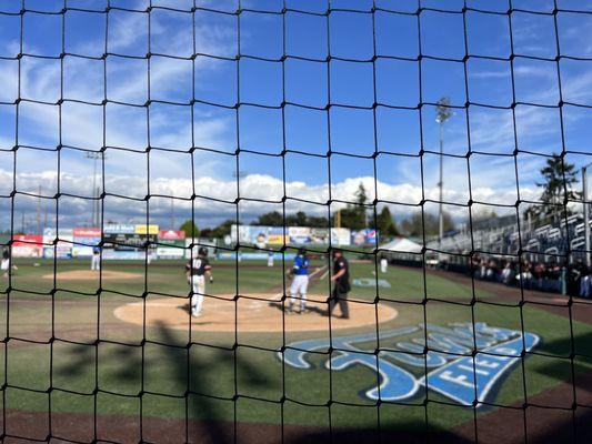 High school baseball. Fun for the kids to play here.