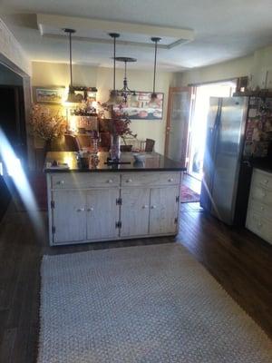 This is a Antique Crackle French Country Cabinet Finished by Jeff Woods and helper.
A kitchen redone and updated.