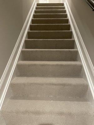 Brand new carpet on stairs left filthy. No protective blankets used...