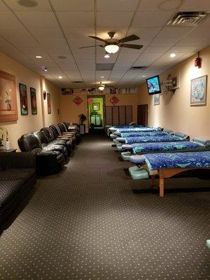 Recliners for reflexology,  rables for body massage.