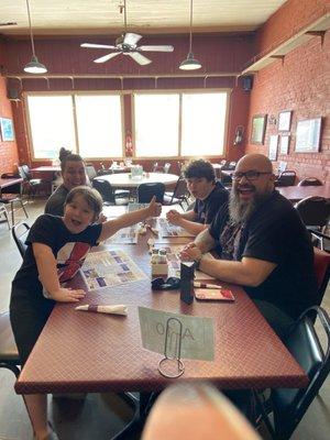 My sweet family. We love visiting new towns and enjoying their offerings. Eating lunch here at Depot Junction.