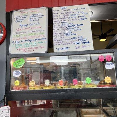 Menu and different empanadas in baskets