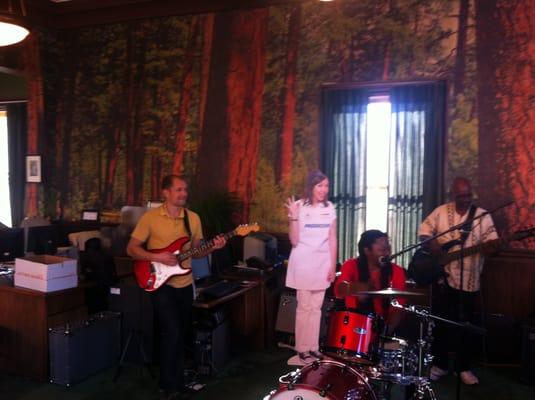 Rhythm Culture Reggae Band with Flo performing at Larsen Flynn's Offices at Third Annual Silverton Sidewalk Shindig 2014.