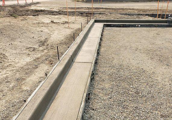 Concrete curbs and gutters, driveways, garage and basement floors, sidewalks, patios,  RV and trash pads.