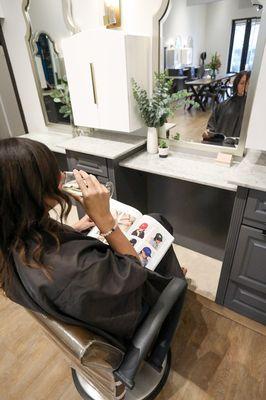 Sit back, relax and have a glass of wine all while getting your hair done.