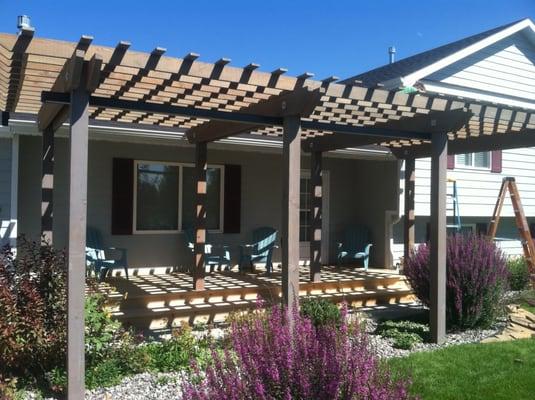 Custom Deck with pergola by fence pro