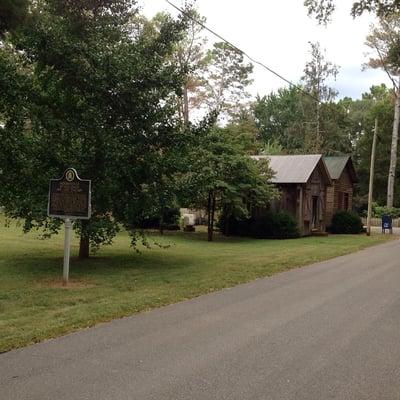 Historical marker and back of Post Office.