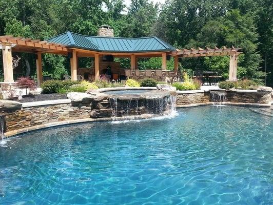 Pool Pavilion with Water Feature and Swimming Pool