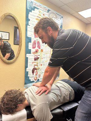 Upper back adjustment by Dr. David