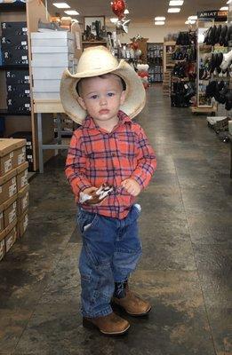 My grandson with his boots, hat and horse from Lebo's