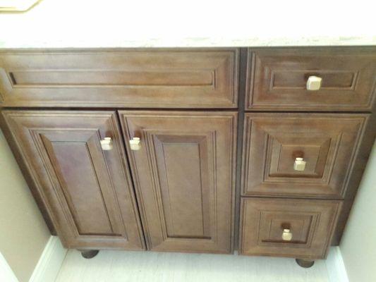 Get rid of that pedistal sink and purchase a functional vanity.  It will elevate your space and give you.more storage!