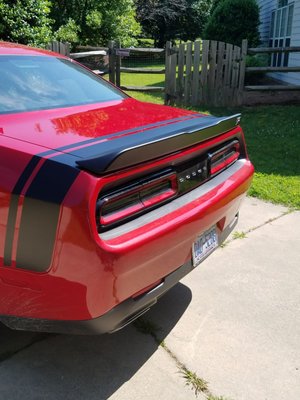 Racing stripe and spoiler were expertly applied and installed