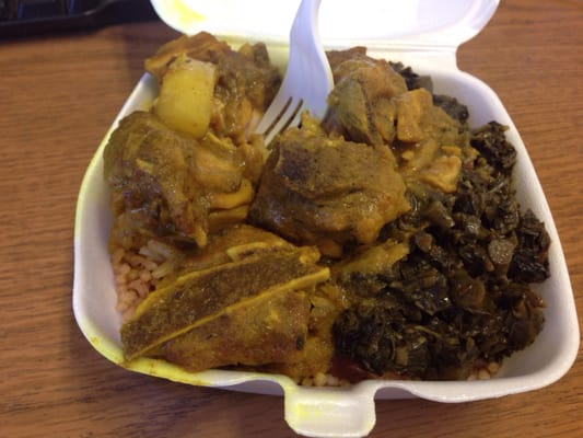 Curry chicken, rice and peas, and callaloo