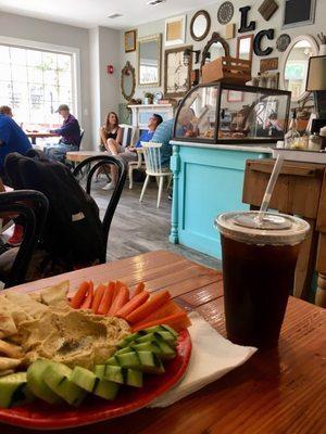 Large cold brew and hummus platter