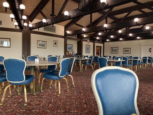 Dinning Room with large window opened on gold course