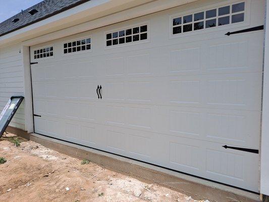 16×7 amarr garage door! With magnetic hinges and handles!