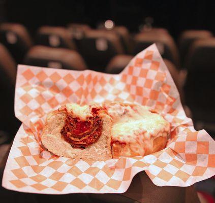 Eat in the Here-After theater during a comedy show or movie!