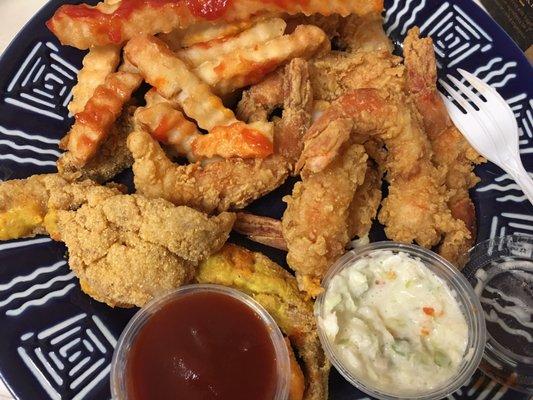 Fried whiting dinner came w/ fries & slaw. Side order of fried shrimp came with cocktail sauce & saltines. Good stuff!