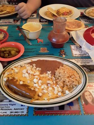 Combo danner  enchiladas, rice, beans