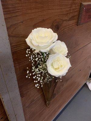 Floral decorations at a Christmas country wedding at converted barn.