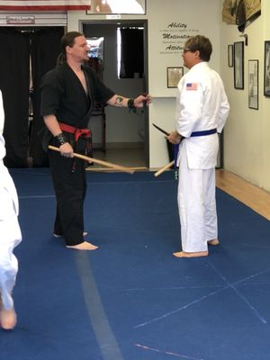 Teaching the adults some stick and knife techniques (adults are the only class that get to work on weapons)!