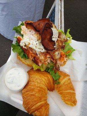 Salmon croissant served breakfast style $14