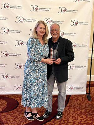 Dr. Beth receives service award from Dr. Jack Bourla!