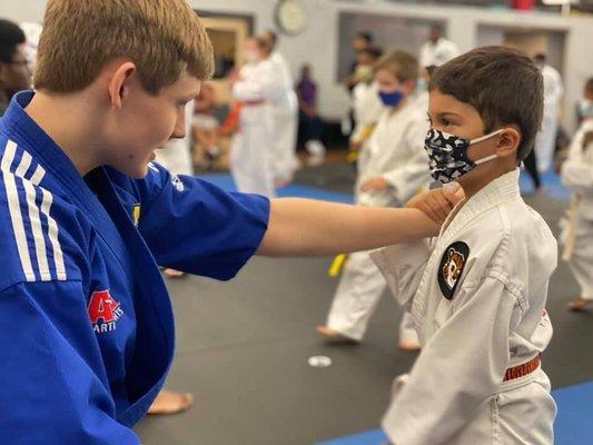 An Instructor Practicing with a child