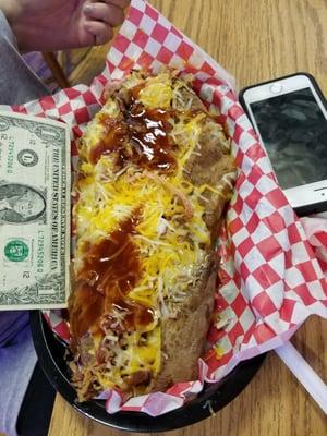 Their Grand Slam baked potato, covered with pulled pork, cheese, onions and BBQ sauce.  It is kinda BIG, and tasty.