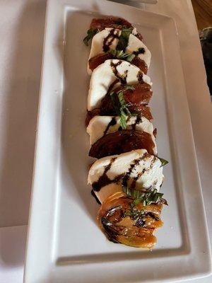 Roasted Tomato Caprese  ($9) Roasted Roma tomatoes, mozzarella, basil, extra virgin olive oil, balsamic