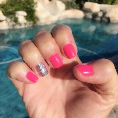 Pink nails with bling.