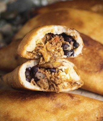 Pabellón Empanada: Shredded Beef, black beans, plantains and white cheese