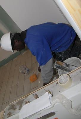 Bruno, installing wood look tile.