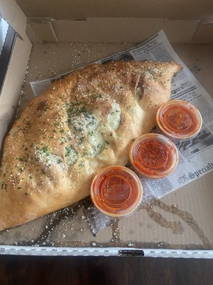 6/22/24 chicken cheesesteak calzone w fried onions.