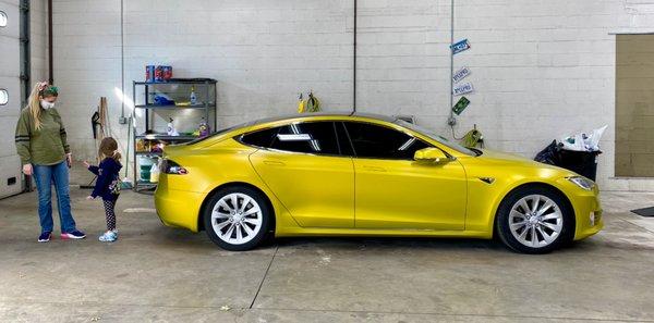 Tesla Model S wrapped in 3M Satin Bitter Yellow