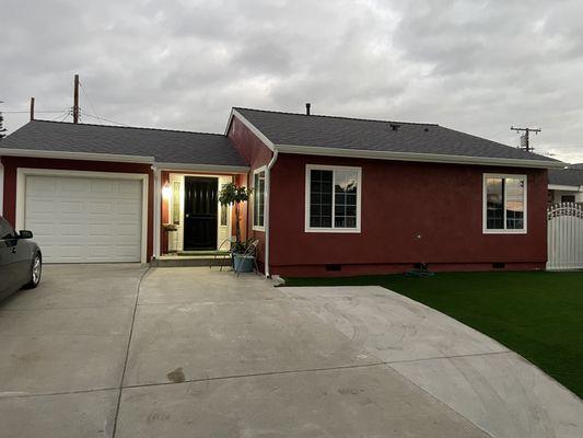 Freshly painted home with a new roof and windows.