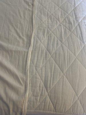 short sheet with exposed mattress pad