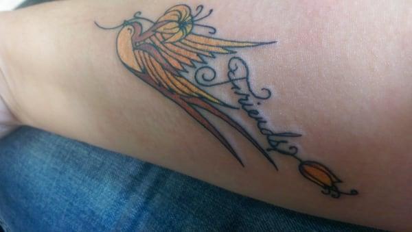 Harmey did awesome job on my bird/best friend tattoo i love it, he also did my awesome dream catcher with tribal horse tattoo..