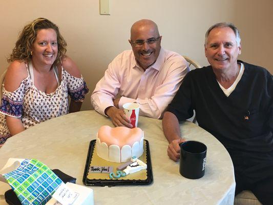 Dr. Sallustio with Dr. Allard (Oral Surgeon) and one of our Very Happy Patients who surprised us with this Cake!!