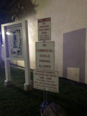 Sign that doesn't list tow companies name. Not compliant.