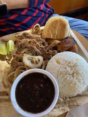 Vaca Frita with white Rice And Beans. With a side of Plantains