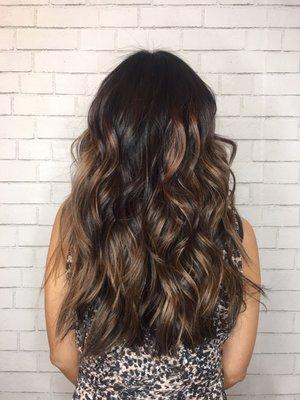 Caramel balayage and long layered haircut