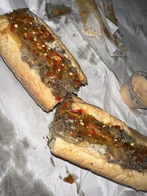 Steak and cheese sub with cherry peppers