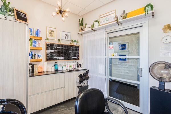 Inside the studio looking toward the haircolor organizer and the cabinetry.