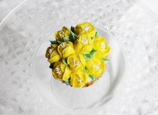 Jumbo Cupcakes with bouquet of flowers on top!