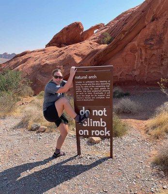 Sarah hamming it up at Arch Rock!