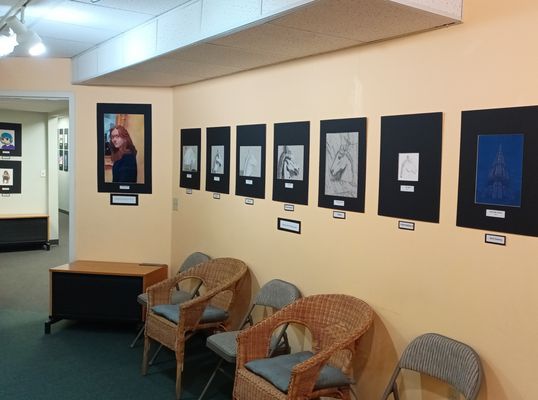 ActonArt lobby filled with student artwork.  ActonArt offers Drawing, Painting, and Manga Classes for kids, teens and adults.